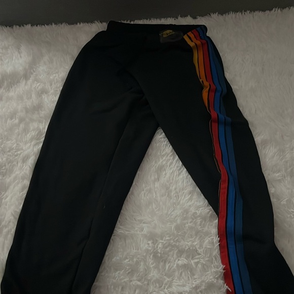 Aviator Nation Pants - Aviator nation sweatpants. Black with orange, yellow, red and blue stripes.